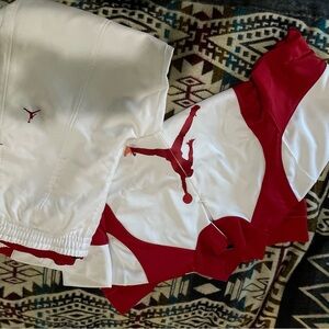 Men’s Jordan Red and White Athletic track suit. Includes 2 zip up jackets.